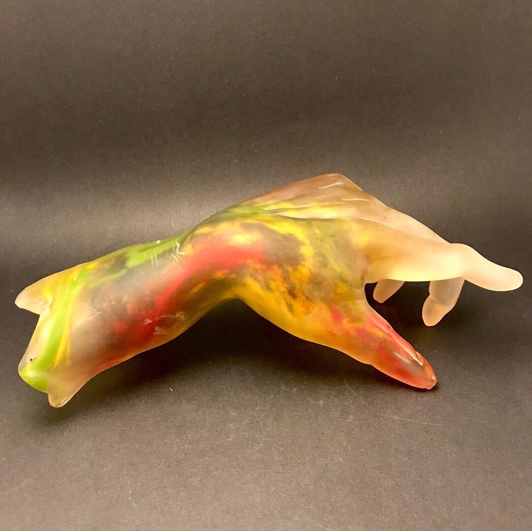 Colorful glass hand sculpture