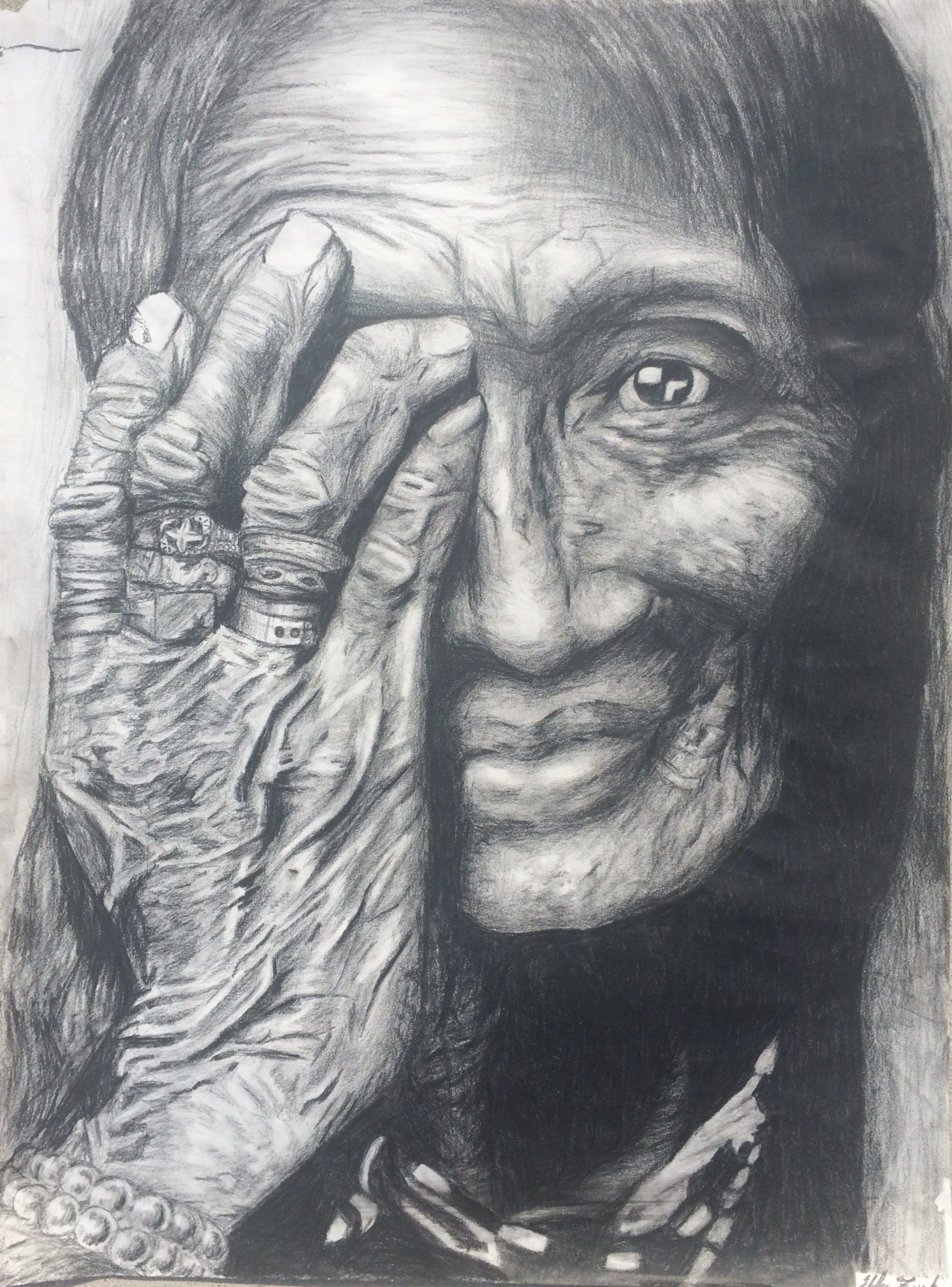 Pencil drawing of a wrinkled woman